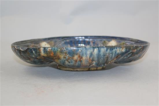 A French Palissy style lead glazed earthenware oval dish, 16th / 17th century, 23cm, rim chip and restoration